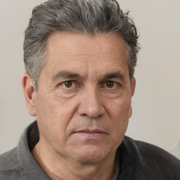 Neutral white middle-aged male with short  gray hair and brown eyes