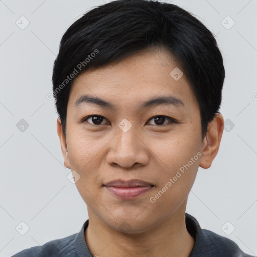 Joyful asian young-adult male with short  black hair and brown eyes