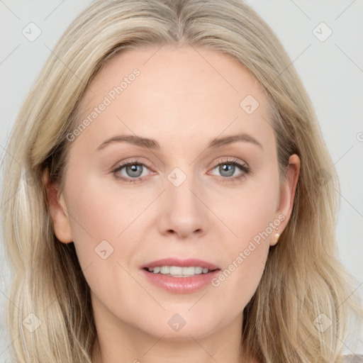 Joyful white young-adult female with long  brown hair and blue eyes