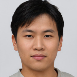 Neutral asian young-adult male with short  brown hair and brown eyes