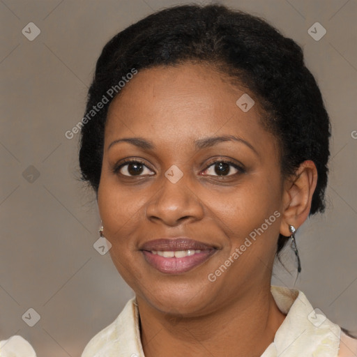 Joyful black young-adult female with medium  black hair and brown eyes