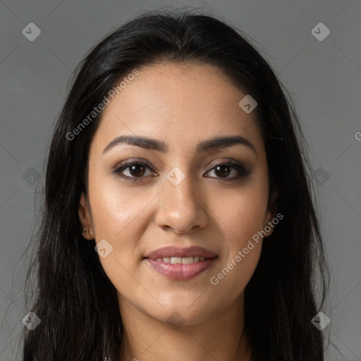 Joyful latino young-adult female with long  brown hair and brown eyes