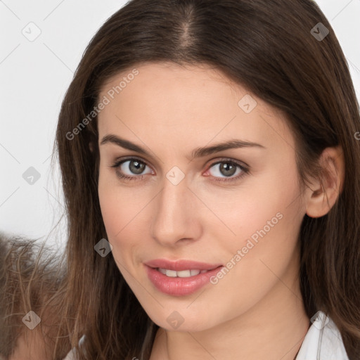 Neutral white young-adult female with long  brown hair and brown eyes