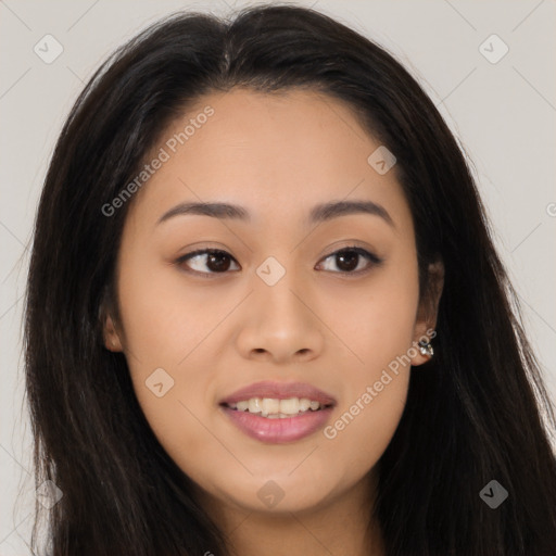 Joyful asian young-adult female with long  brown hair and brown eyes