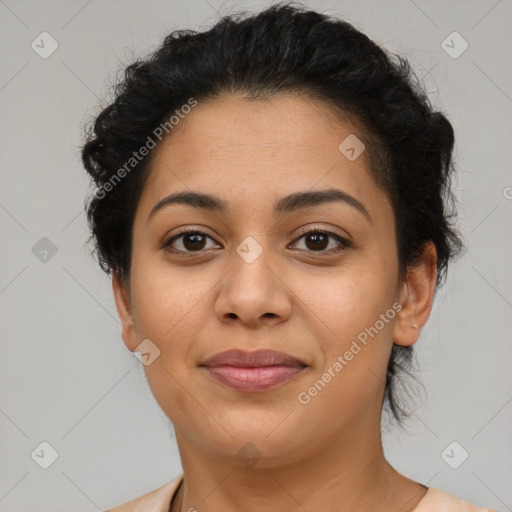 Joyful latino young-adult female with short  brown hair and brown eyes