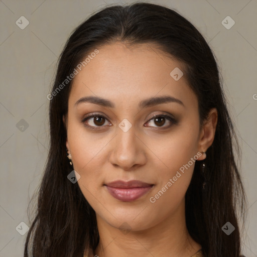 Joyful latino young-adult female with long  brown hair and brown eyes