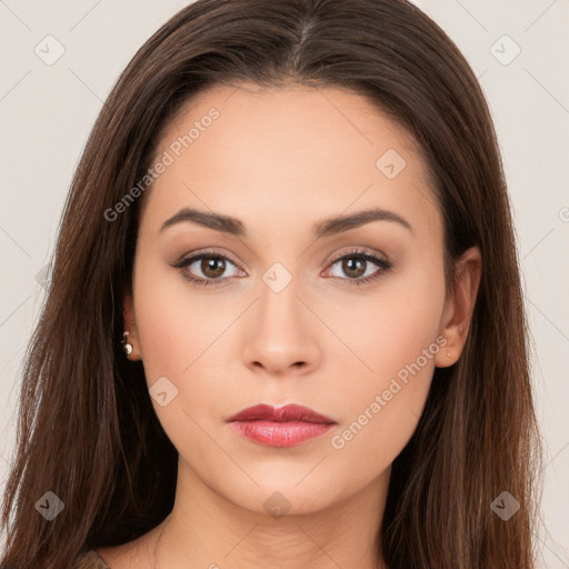 Neutral white young-adult female with long  brown hair and brown eyes