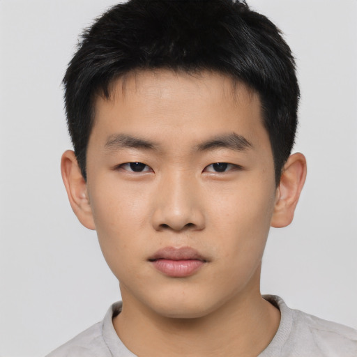 Neutral asian child male with short  black hair and brown eyes