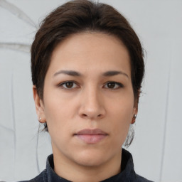 Neutral white young-adult female with short  brown hair and brown eyes