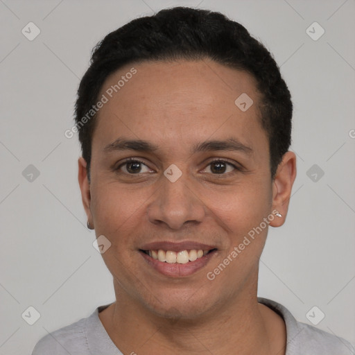 Joyful white young-adult male with short  black hair and brown eyes