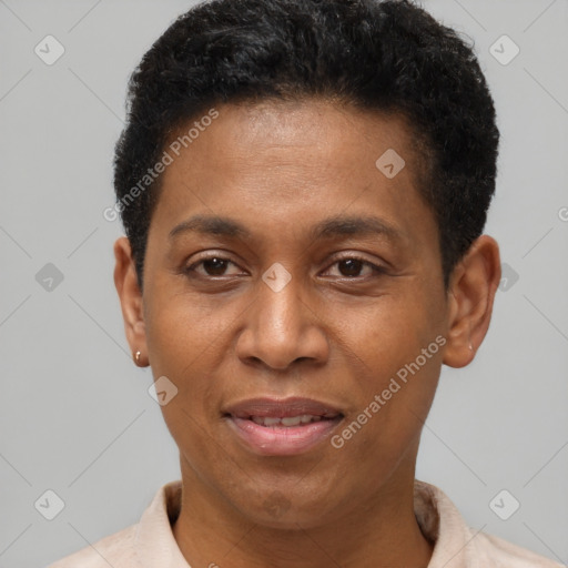 Joyful black young-adult male with short  brown hair and brown eyes