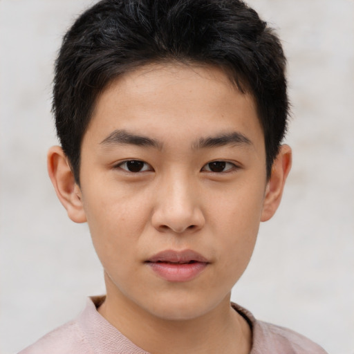 Neutral asian child male with short  brown hair and brown eyes