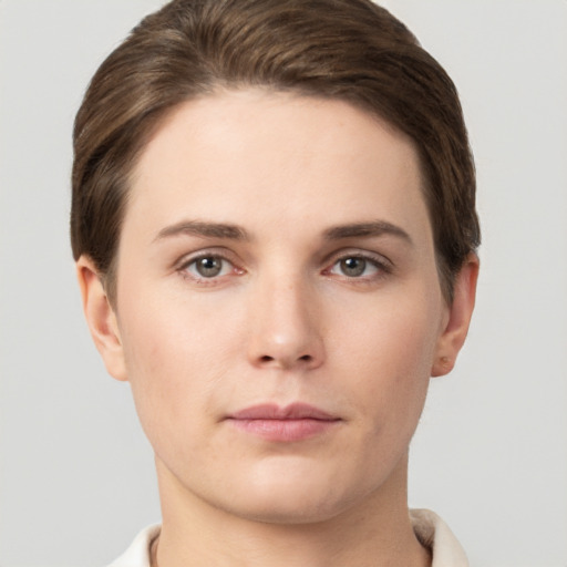 Neutral white young-adult female with short  brown hair and brown eyes