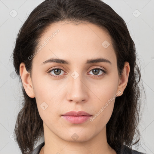 Neutral white young-adult female with medium  brown hair and brown eyes