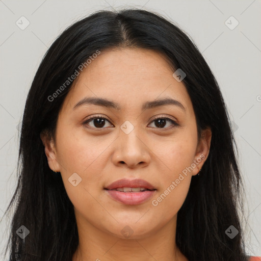 Joyful latino young-adult female with long  brown hair and brown eyes