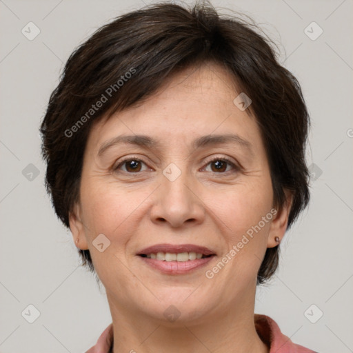 Joyful white adult female with medium  brown hair and brown eyes