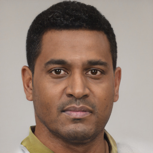 Neutral black young-adult male with short  black hair and brown eyes