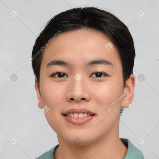 Joyful asian young-adult female with short  black hair and brown eyes