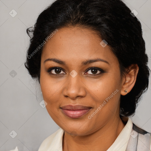 Joyful black adult female with medium  brown hair and brown eyes