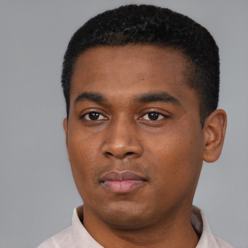 Neutral black young-adult male with short  black hair and brown eyes