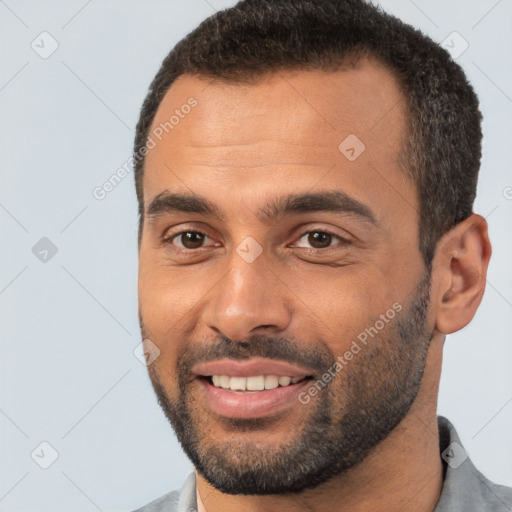 Joyful white young-adult male with short  brown hair and brown eyes