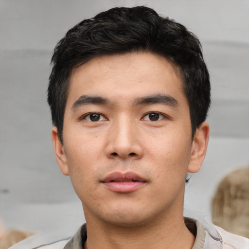 Neutral asian young-adult male with short  black hair and brown eyes