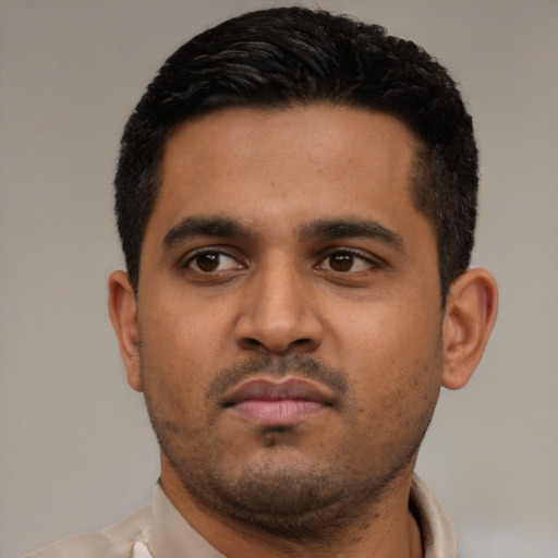 Neutral black young-adult male with short  black hair and brown eyes