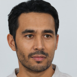 Neutral asian young-adult male with short  black hair and brown eyes