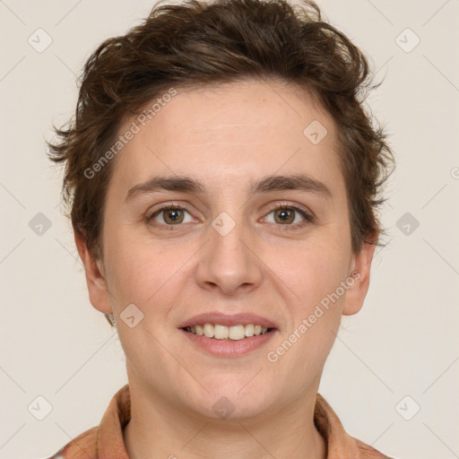 Joyful white young-adult female with short  brown hair and grey eyes