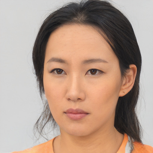 Neutral asian young-adult female with medium  black hair and brown eyes
