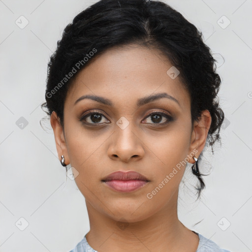 Joyful latino young-adult female with medium  black hair and brown eyes