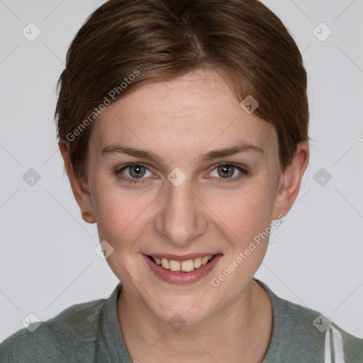 Joyful white young-adult female with medium  brown hair and grey eyes