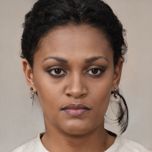 Neutral black young-adult female with short  brown hair and brown eyes