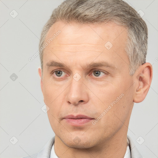 Neutral white adult male with short  brown hair and brown eyes