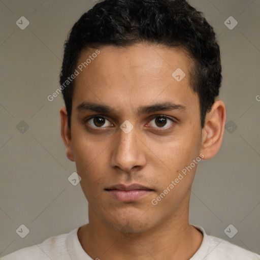 Neutral white young-adult male with short  black hair and brown eyes