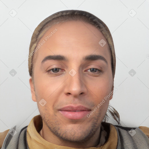 Joyful white young-adult male with short  brown hair and brown eyes