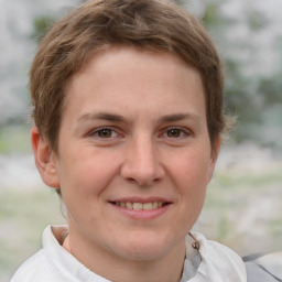 Joyful white young-adult female with short  brown hair and grey eyes