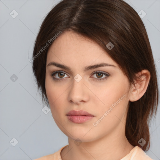 Neutral white young-adult female with medium  brown hair and brown eyes