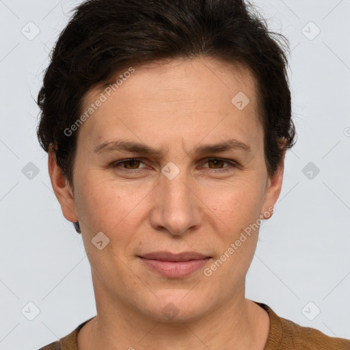 Joyful white adult female with short  brown hair and brown eyes