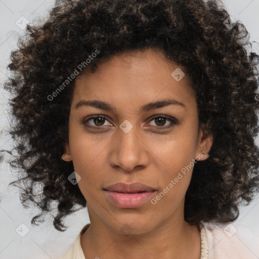 Neutral black young-adult female with medium  brown hair and brown eyes