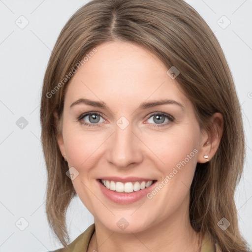 Joyful white young-adult female with medium  brown hair and grey eyes