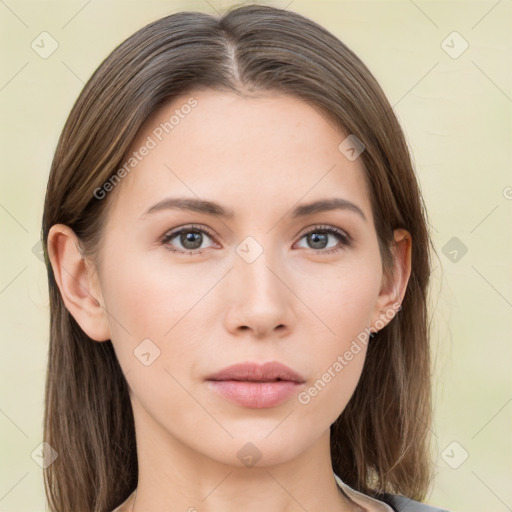 Neutral white young-adult female with long  brown hair and brown eyes