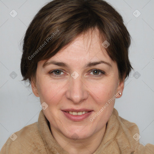 Joyful white adult female with medium  brown hair and brown eyes