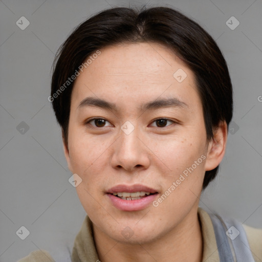 Joyful asian young-adult male with short  brown hair and brown eyes