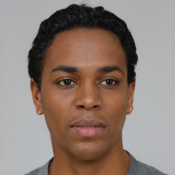 Neutral black young-adult male with short  black hair and brown eyes