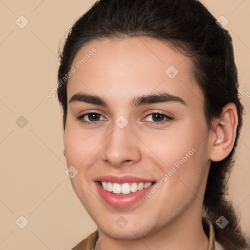 Joyful white young-adult female with medium  brown hair and brown eyes