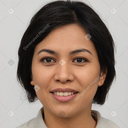 Joyful asian young-adult female with medium  brown hair and brown eyes