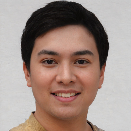 Joyful asian young-adult female with short  black hair and brown eyes