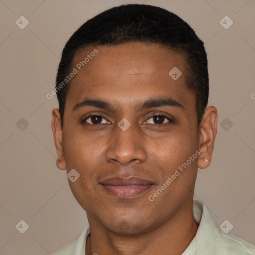 Joyful black young-adult male with short  black hair and brown eyes