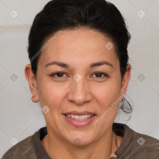 Joyful white adult female with short  brown hair and brown eyes